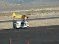 airplane lands on RV