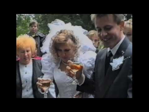Bride tips champagne on her head