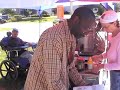 Self employed business owner selling hot dogs.