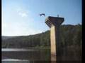 Kid jumps off a 30 ft column, BACK SMACKS!!!