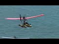 Thrilling Video of Ultralight Over Grassy Hills & Water