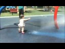 Maya in the sprinklers 71308