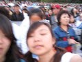 michelle and i singing along with some korean folk song guy at hollywood bowl korean concert 2007.  yah.. we were bored.  haha.