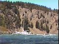 Sailboat struggling against fast current in Deception Pass
