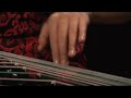 the charm of traditional chinese music interpreted by liu fang on pipa (chinese lute or guitar)with four strings and guzheng (chinese zither or harp)with 21 strings spanned over movable bridges.

liu fang has achieved international reputation for her masterful and deeply spirited playing of chinese pipa and guzheng music from the traditional chinese classical repertoire. 
the video clip is an extract (4min.) from a documentary by cbc tv (bravocanada) broadcasted on january 12, 2008, 8:30pm about a collaboration (