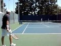Mardy Fish practicing his return of serves against Jesse Levine at the 2009 LA Tennis Open.
