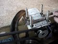 Motor powered coil guide Motor powered coil guide