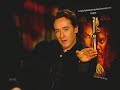 JOHN CUSACK CHECKS IN, BUT NOT OUT
