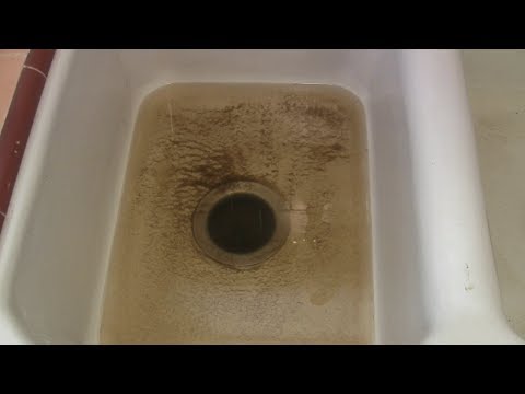 how to unclog a sink that is full of water