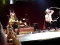 Encouraging fans to sing along to...