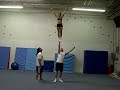 Toss left cupie pop to right pull 1 arm stretch 3/4 full up