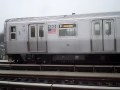 Coney Island-Bound R160B F Train enters and leaves Bay Parkway