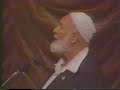 Part (12/17): www.youtube.com Islam And Christianity: Sheikh Ahmed Deedat debates Prof. Van Rooy at the University of Potchefstroom. Sheikh Ahmed Deedat: In 1986, the King Faisal Foundation awarded the King Faisal International Prize for SERVICE TO ISLAM, to a South African who is more or better known than many dignitaries in their own countries. This was the first time that this prestigious award has been awarded to a South African. The recipient of this award was a man totally dedicated to his faith and its propagation and who was not afraid to challenge any one to a debate to settle once and for all the matter, who has the good news right? He was none other than Sheikh Ahmed Deedat, reverently known and called UNCLE by those who hold him in high esteem and admiration. The award came after a lifetime of struggle to propagate Islam and to defend Islam against the onslaught of the missionaries. Finally, he was given recognition by the international Muslim community that he deserved and focused more sharply the attention of the Muslim world on the most important aspect of his work, the challenge to propagate Islam. This was his life long ambition to focus the Muslim world's attention and resources on the propagation of Islam, and at last he succeeded. What a moment of jubilation, achievement and personal gratification for Sheikh Deedat the award was, a turning point in his life. Sheikh Deedat did not have much formal schooling, but he was self-taught through experience and <b>...</b>