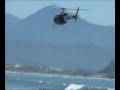 videos de Helicóptero da PM sobrevoa Praia das Toninhas..mpg