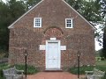hidden symbolism on a church.  freemasons at work?  watch in high quality.
gorilla199 has graciously explained these symbols with more clarity.  he states:
0.14 
is a winged disc
there is a bird and also a side view cutaway view of a flying disc above the bird
0.53 the 3 dots in the middle of two lines is also a winged/horned disc the same as at alexandra (nibiru) palace in london but it has a variation by using 3 discs instead of one
1.55
the 
