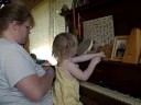 Misty and Becky play piano