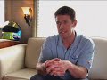 Carl Edwards admires the Aflac Duck