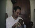 i'm playing my ugandan didjeridoo with bakhita in oluko village, arua district - north west of uganda