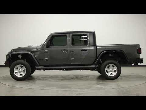 Used 2022 Granite Crystal Metallic Clearcoat Jeep Sport image 1