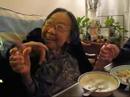 Grandma praying before dinner