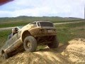 Mud, dirt piles and broken parts
