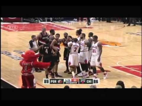 Joel Przybilla and Carlos Boozer exchange words