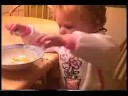 Little Sue eating corn and feeding Perry