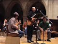 Members of Ozomatli perform Bob Dylan's 