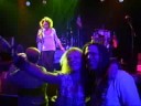 Jampara and the batalion background vocals, sings lead