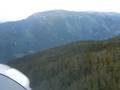 flying a c42b over a mountain in Flatdal Norway