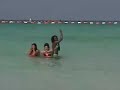 girls in bikinis acting goofy