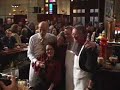 DaimlerChrysler's Dieter Zetsche serving drinks