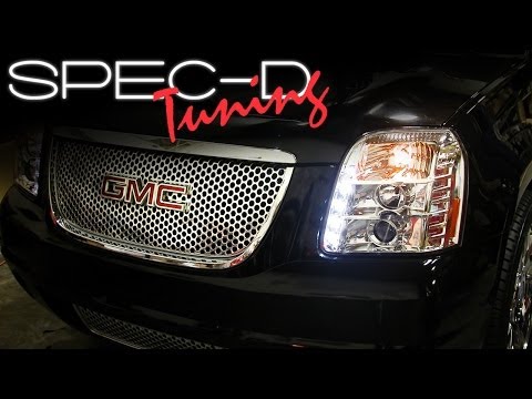 how to adjust headlights on 2007 gmc yukon
