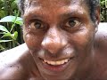 travelling by boat with friends - Asmat Papua