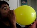 Blowing a balloon