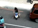 Lady on Tiny Scooter.wmv