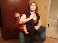 Back carry in a mei tai baby carrier - modified hip-slide.