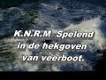 Reddingsboot KNRM (zodiac) speelt in hekgoven .