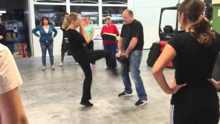 Self defense kick in the balls practice