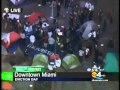 Lyrikill interrupting LIVE news @ Occupy Miami Shutdown 2012! Lil Wayne Justin Bieber Lady Gaga