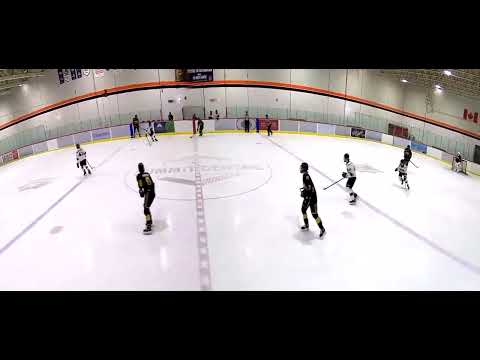 Liam #6 (Black) receives puck and shoots through the defender. (Jan 13/24)