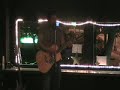 L.C. performs 2 minutes to midnight on a 12 string