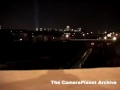 Women on brige looking at WTC memorial lights in distant,... Women on brige looking at WTC memorial lights in distant,...