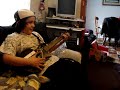 Jugando Guitar Hero en el Nintendo Wii