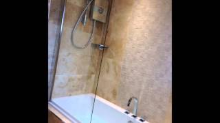 August's Bathroom installation with Travertine Limestone!