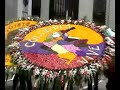 i filmed this footage in medellin 2001 and recently edited it.  its a festival celebrating the flowers of colombia every year in august.  most of the footage you see is the closing event where the silleteros, dancers, musicians, parade down a main street in medellin.  the silleteros are the farmers who grow the flowers and carry the 