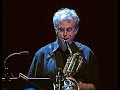 roger rosenberg sax solo, walter becker guitar solo.

this is my favorite rendition of fm ever.  the sax solo is beautiful, michael mcdonald joins them.

steely dan:
donald fagen - keyboards and vocals
walter becker - guitar
keith carlock - drums
jon herington - guitar
carolyn leonhart-escoffery - backing vocals
michael leonhart - trumpet
cindy mizelle - backing vocals
jim pugh - trombone
roger rosenberg - baritone sax
freddie washington - bass
walt weiskopf - sax
jeff young - keyboards and backing vocals