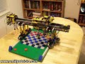 Two turns at checkers with the CheckerBot RCX