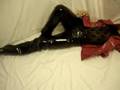 Shiny pvc pants and red coat