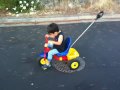 Colin riding his Tricycle